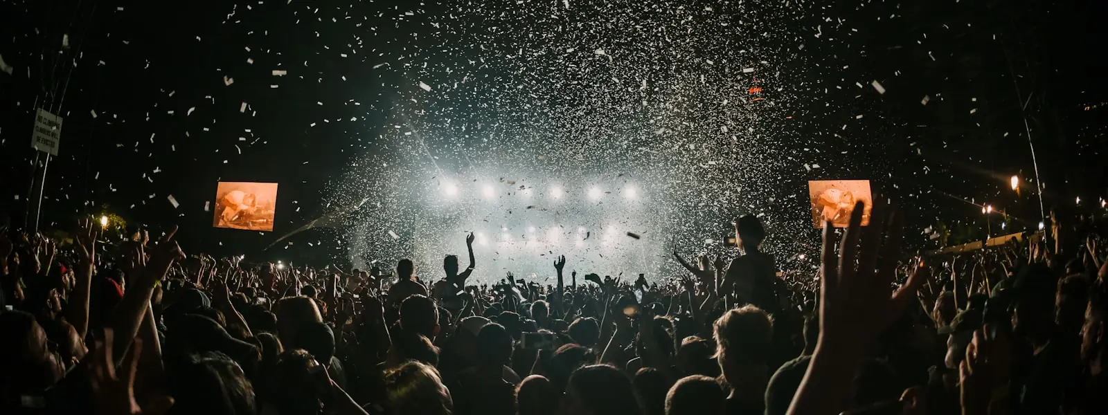 A crowd at an outdoor stage