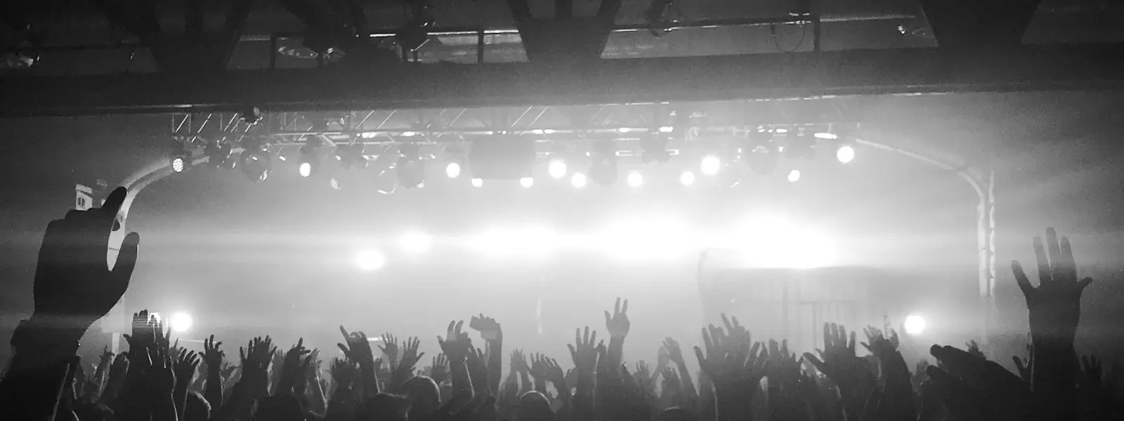A crowd photographed in black and white